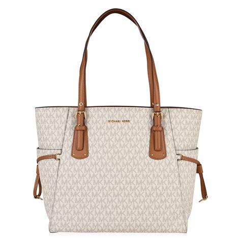 michael kors 3 tone bag|Michael Kors voyager tote sale.